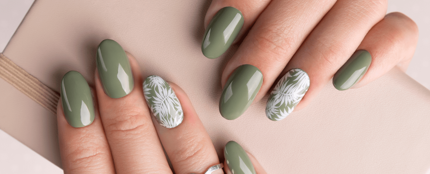 beautiful-womans-hands-with-spring-summer-floral-nail-design 1-min